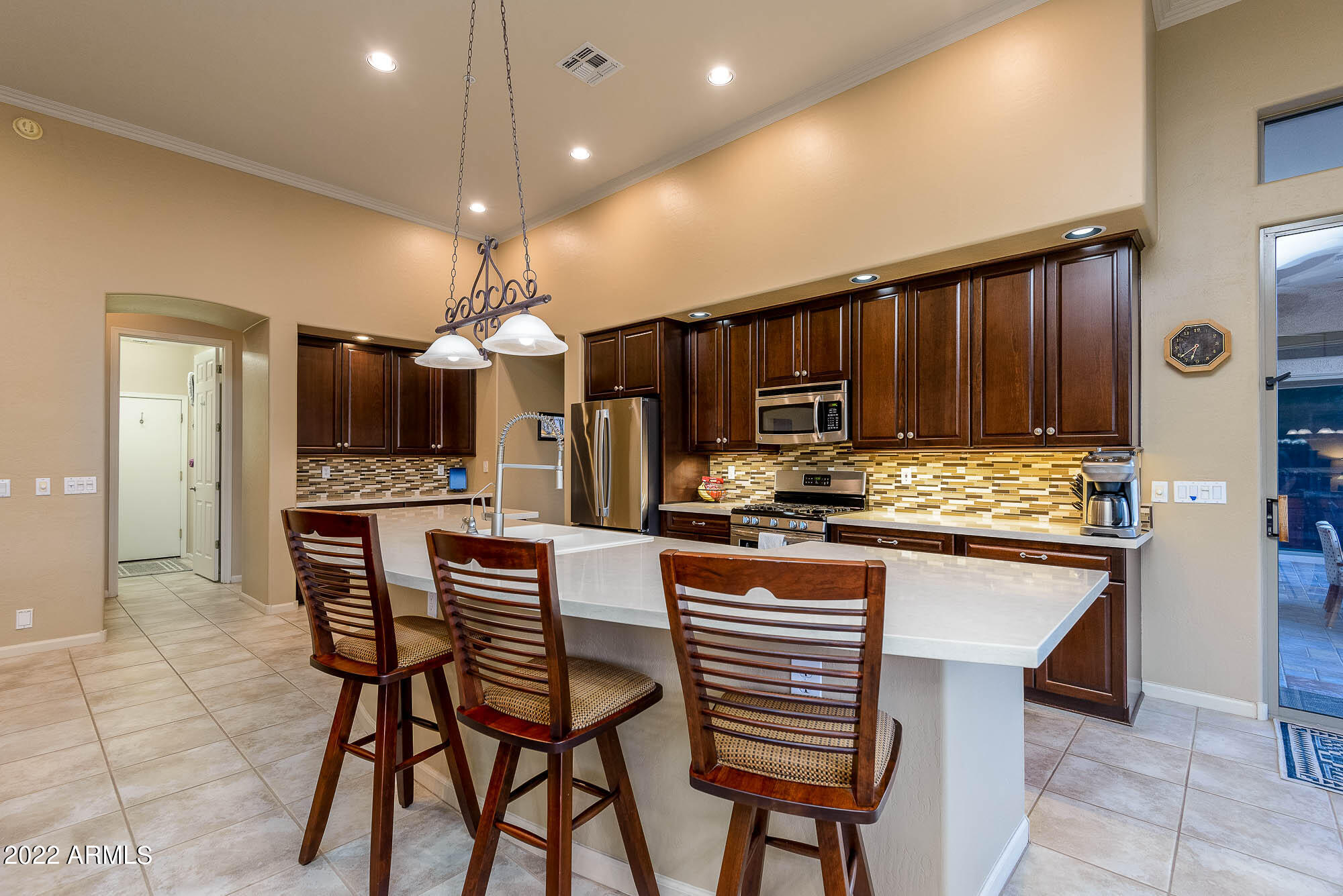 7754 East La Junta Road Scottsdale, AZ 85255 - Photo 32 of 72 a kitchen with a table and chairs in it