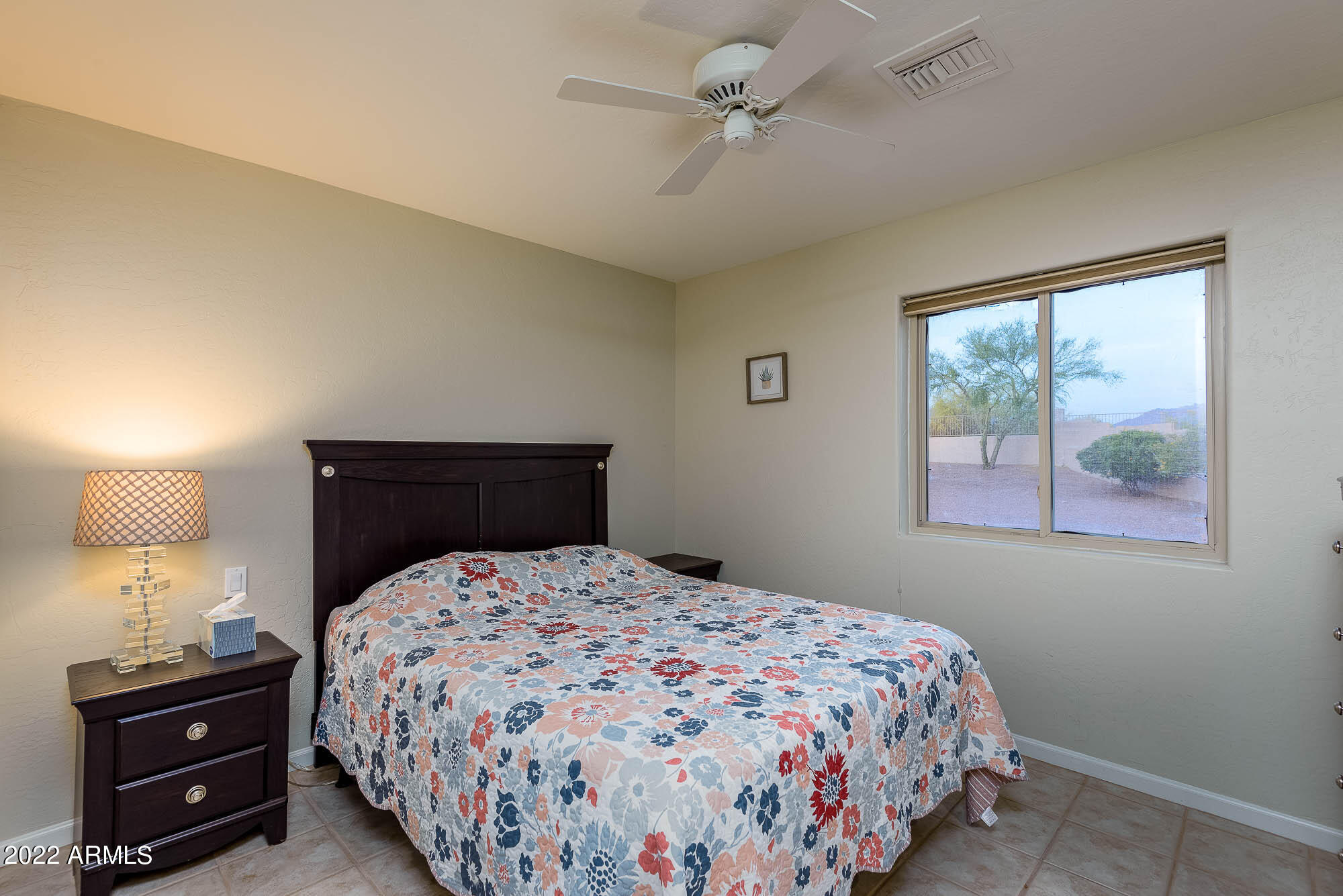 7754 East La Junta Road Scottsdale, AZ 85255 - Photo 45 of 72 a bedroom with a bed and a window