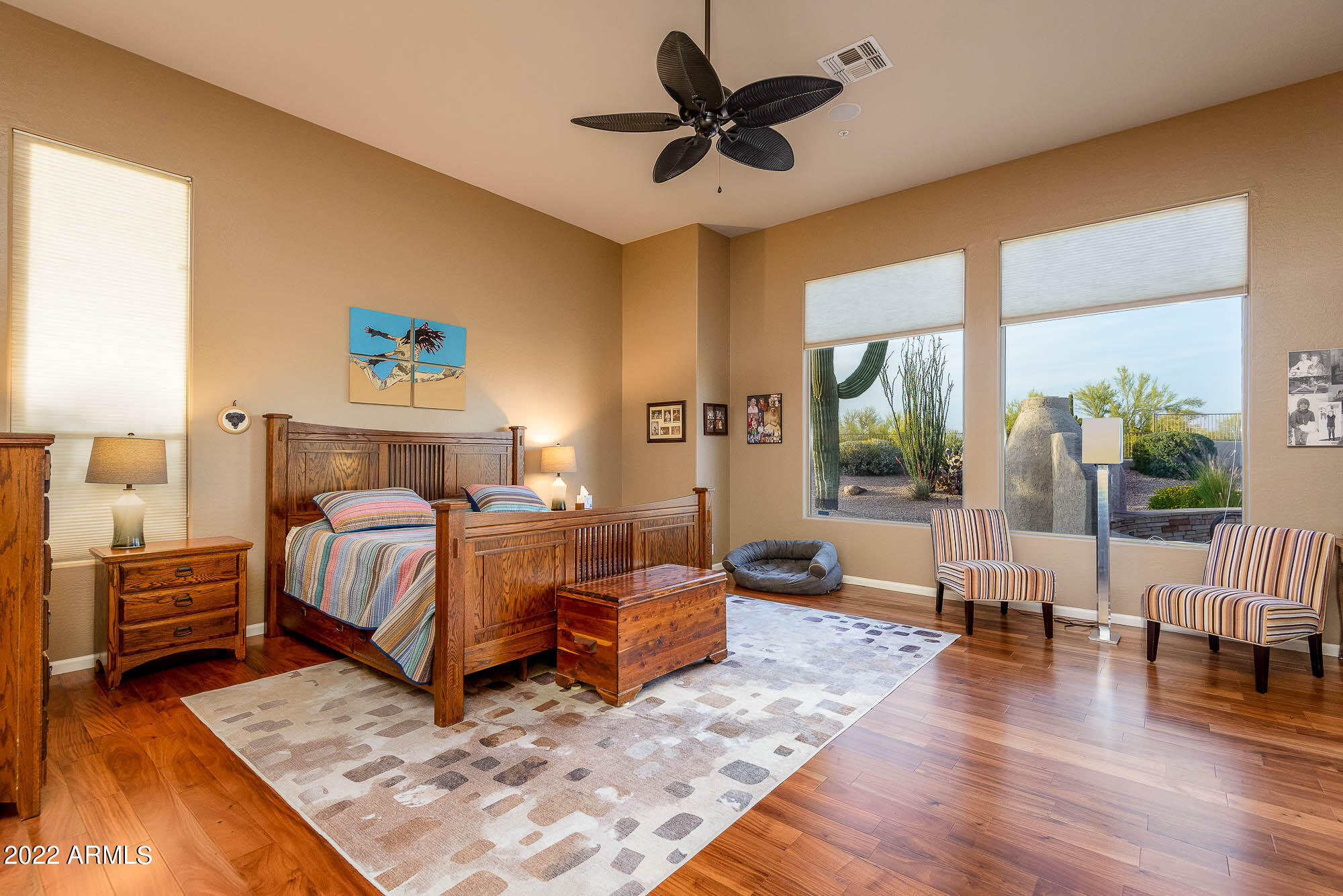 7754 East La Junta Road Scottsdale, AZ 85255 - Photo 5 of 72 a bedroom with a bed and a large window