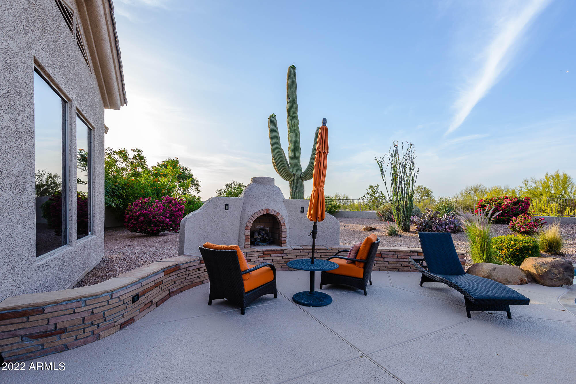 7754 East La Junta Road Scottsdale, AZ 85255 - Photo 59 of 72 a living room with patio furniture and a potted plants