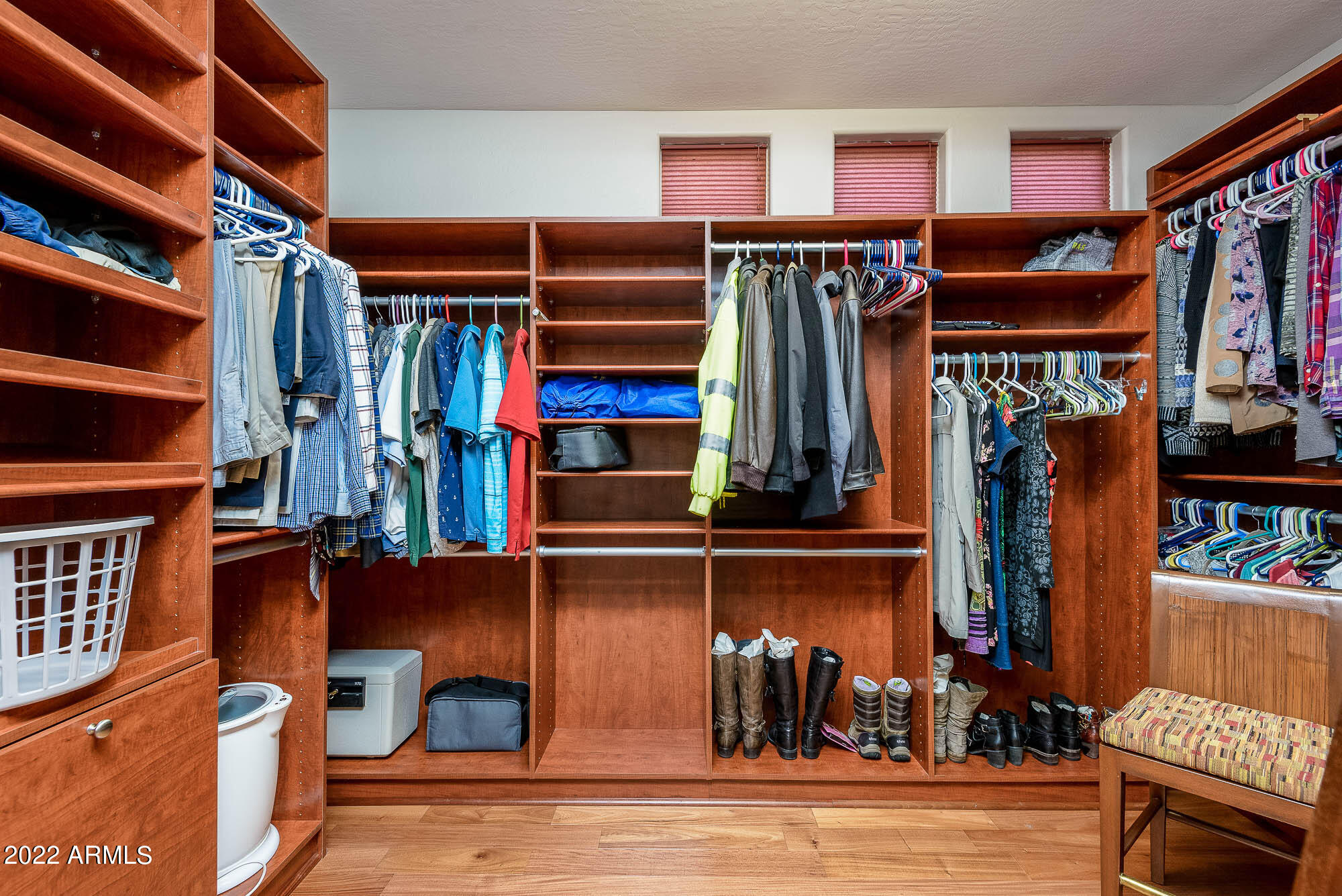 7754 East La Junta Road Scottsdale, AZ 85255 - Photo 7 of 72 a view of walk in closet with clothes and shoes