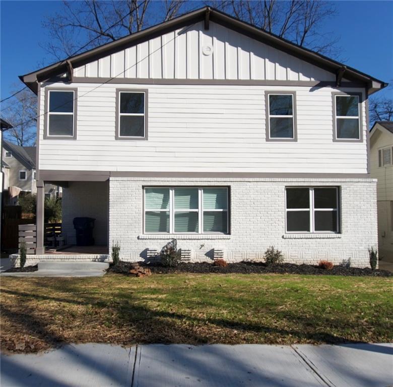 708 Rochelle Drive Southwest Atlanta, GA 30310 - Photo 23 of 24 a front view of a house with a yard