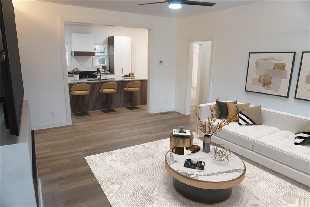 708 Rochelle Drive Southwest Atlanta, GA 30310 - Photo 3 of 24 a living room with furniture and a fireplace