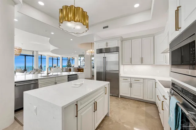 a living room with furniture wooden floor and a table