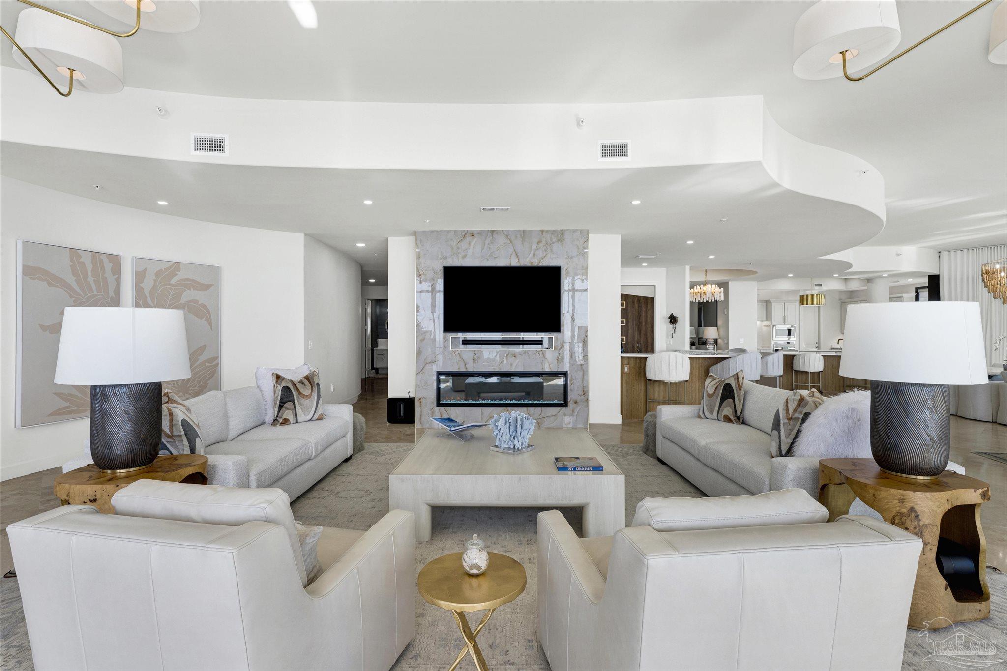 16551 Perdido Key Drive, Unit PH701 Perdido Key, FL 32507 - Photo 24 of 62 a living room with furniture and a flat screen tv