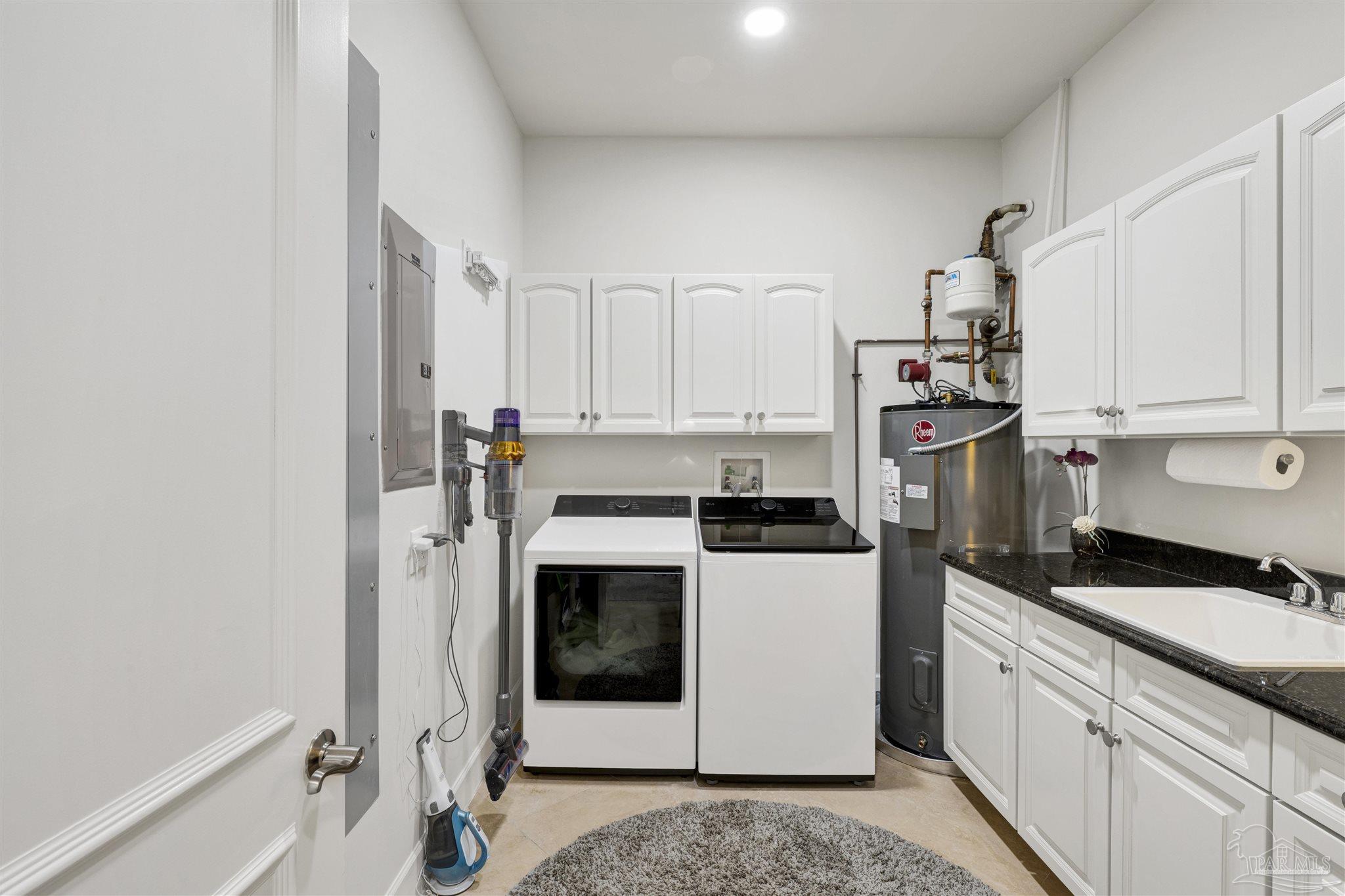 16551 Perdido Key Drive, Unit PH701 Perdido Key, FL 32507 - Photo 47 of 62 a kitchen with stainless steel appliances a stove a sink and a refrigerator