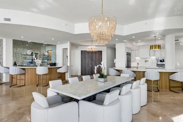 a kitchen with counter top space cabinets and stainless steel appliances