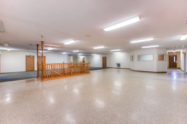 a kitchen with stainless steel appliances granite countertop a sink and cabinets