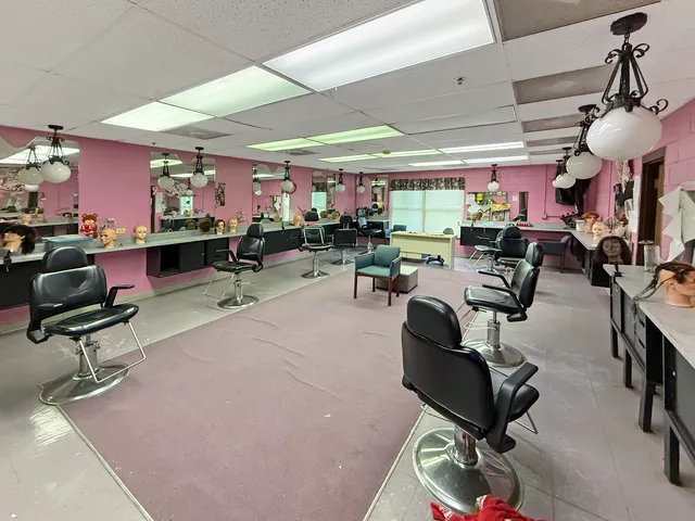 a room with gym equipment and a large window