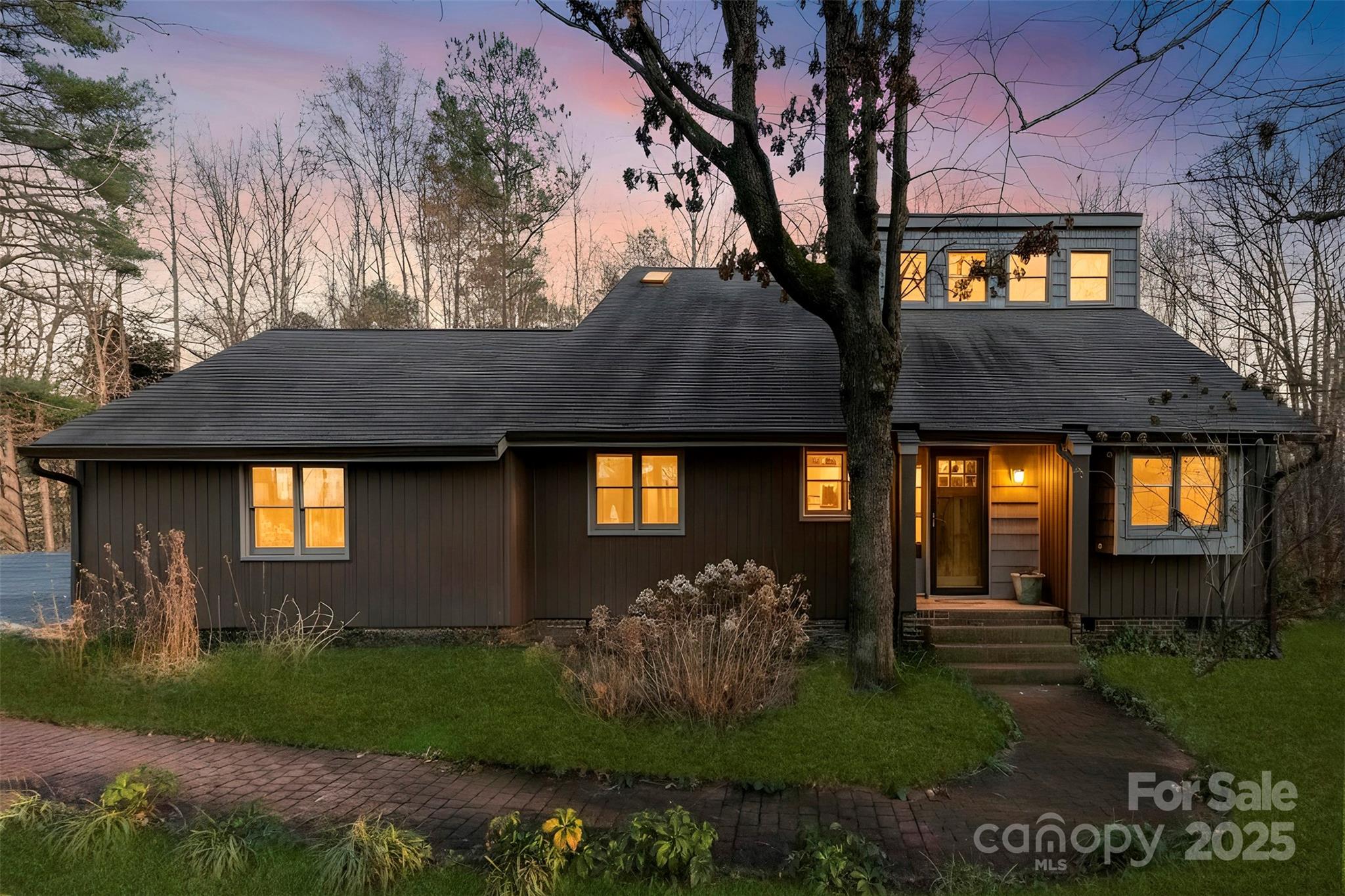 3026 Forbes Road Gastonia, NC 28056 - Photo 2 of 42 a front view of house and yard and trees