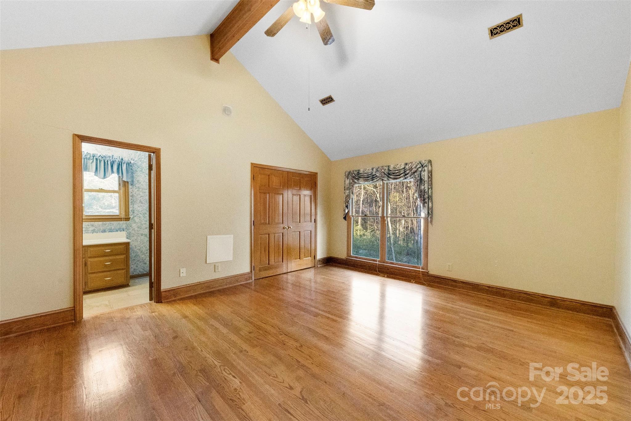 3026 Forbes Road Gastonia, NC 28056 - Photo 23 of 42 a view of an empty room with wooden floor and a window