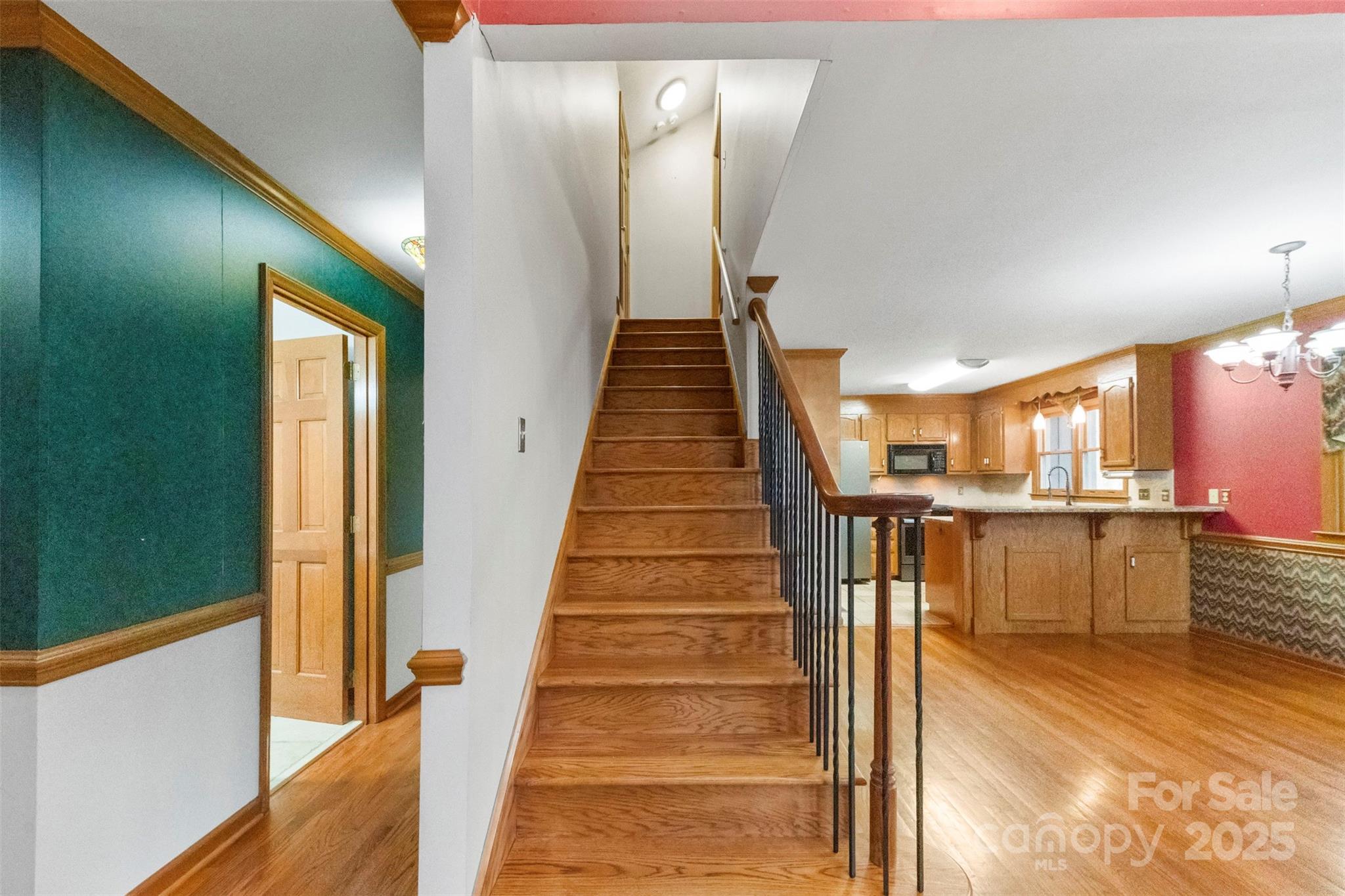 3026 Forbes Road Gastonia, NC 28056 - Photo 3 of 42 a view of entryway and hall with wooden floor