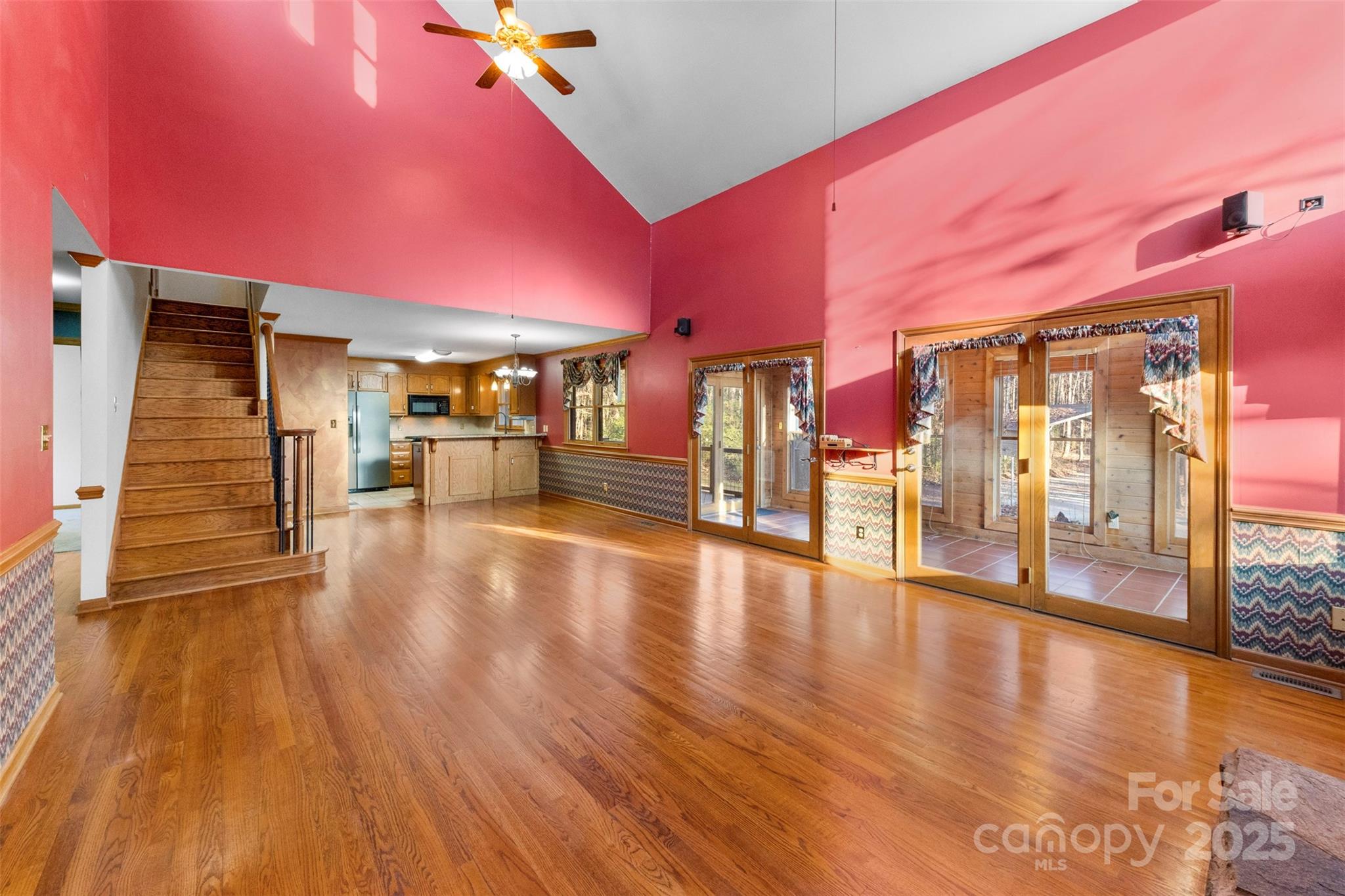 3026 Forbes Road Gastonia, NC 28056 - Photo 7 of 42 a view of a living room with stainless steel appliances wooden floor