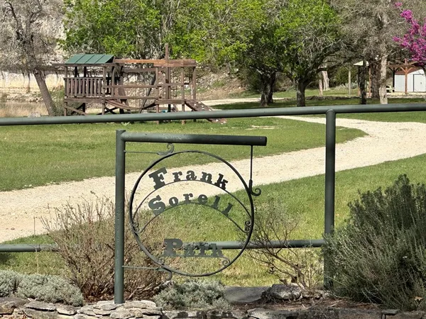 a view of a garden with a houses