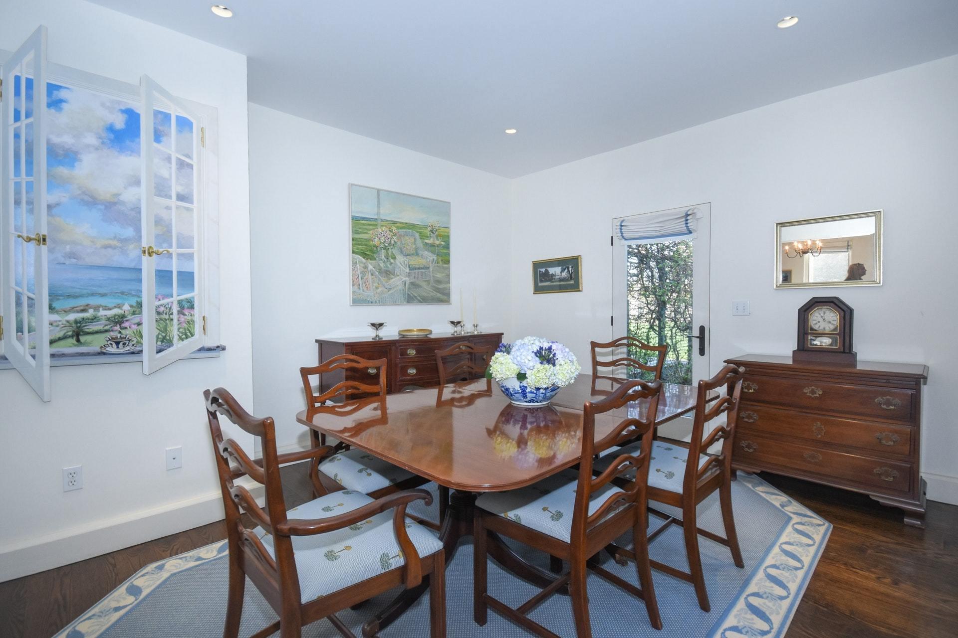 446 Hollow Tree Ridge Road, Unit 4 Darien, CT 06820 - Photo 15 of 37 a view of a dining room with furniture and window