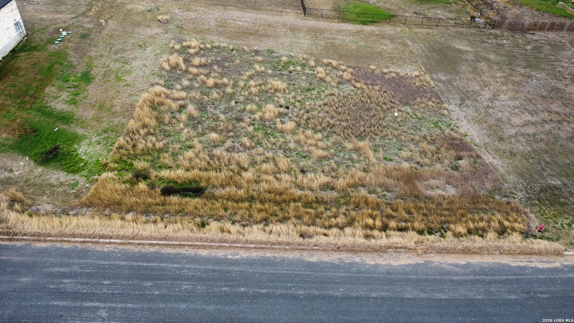 a view of a yard from a space