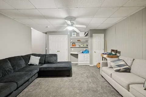 a living room with furniture and a couch
