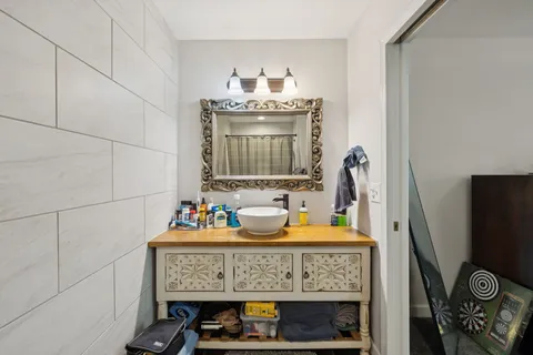 a view of a chair and table in the balcony