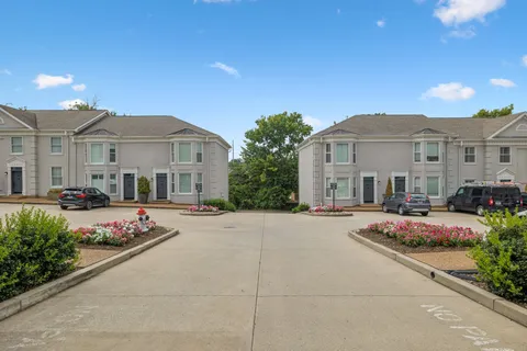 a front view of a house with an outdoor space