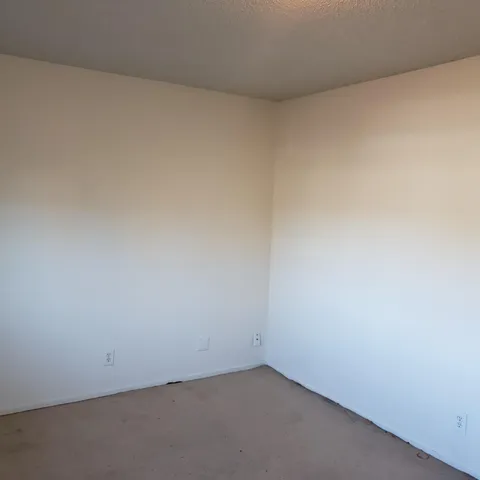 a view of staircase with large window