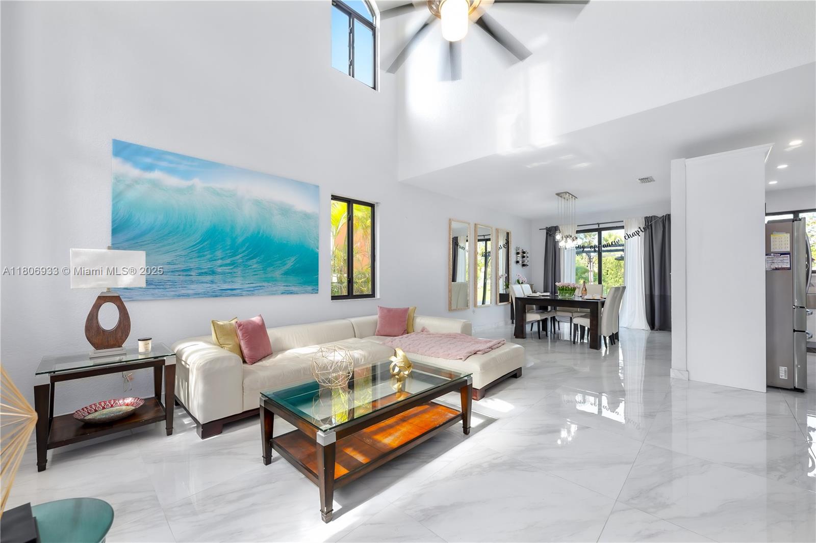 1857 Southeast 20th Road Homestead, FL 33035 - Photo 1 of 31 a living room with furniture and a window