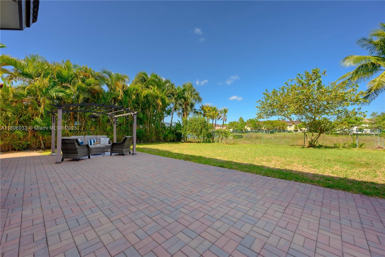 1857 Southeast 20th Road Homestead, FL 33035 - Photo 30 of 31 a view of a house with a yard