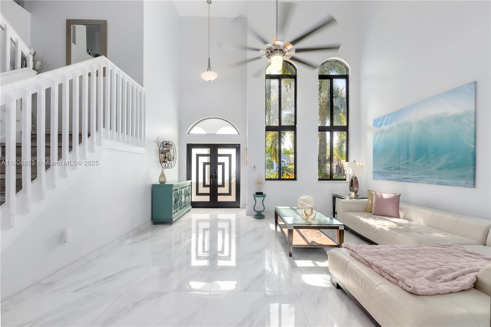 1857 Southeast 20th Road Homestead, FL 33035 - Photo 5 of 31 a living room with furniture and a large window