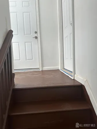 a view of hallway with stairs