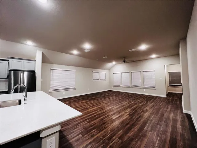 a view of a kitchen with a sink and a oven