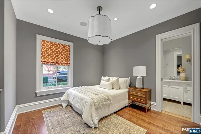 a view of a hallway with a bathtub
