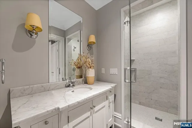 a living room with fireplace furniture and a flat screen tv