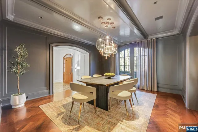 a bathroom with a sink a vanity and a mirror