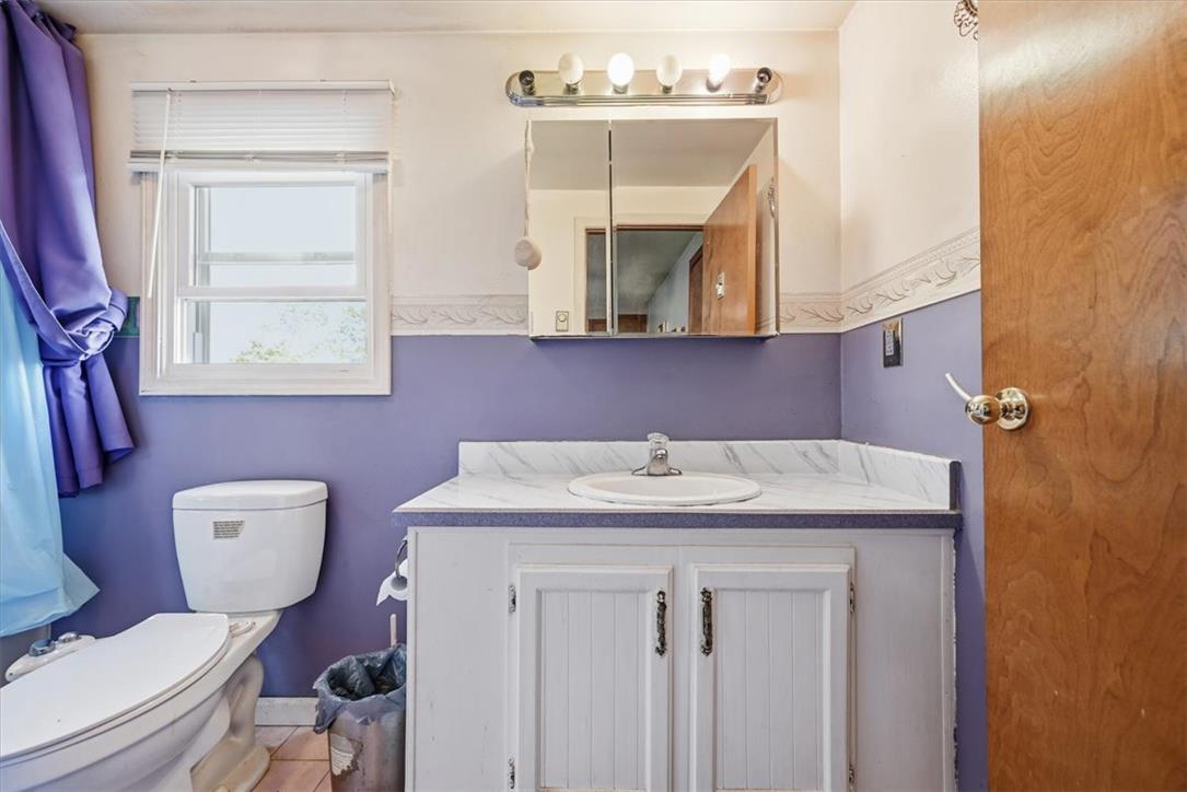 74 Swiss View Road Lehighton, PA 18235 - Photo 40 of 59 Natural light streams through a classic window into this functional bathroom.