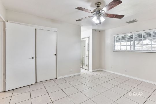 528 South Sorrel Street Ridgecrest, CA 93555 - Photo 20 of 27 a view of an empty room with a window