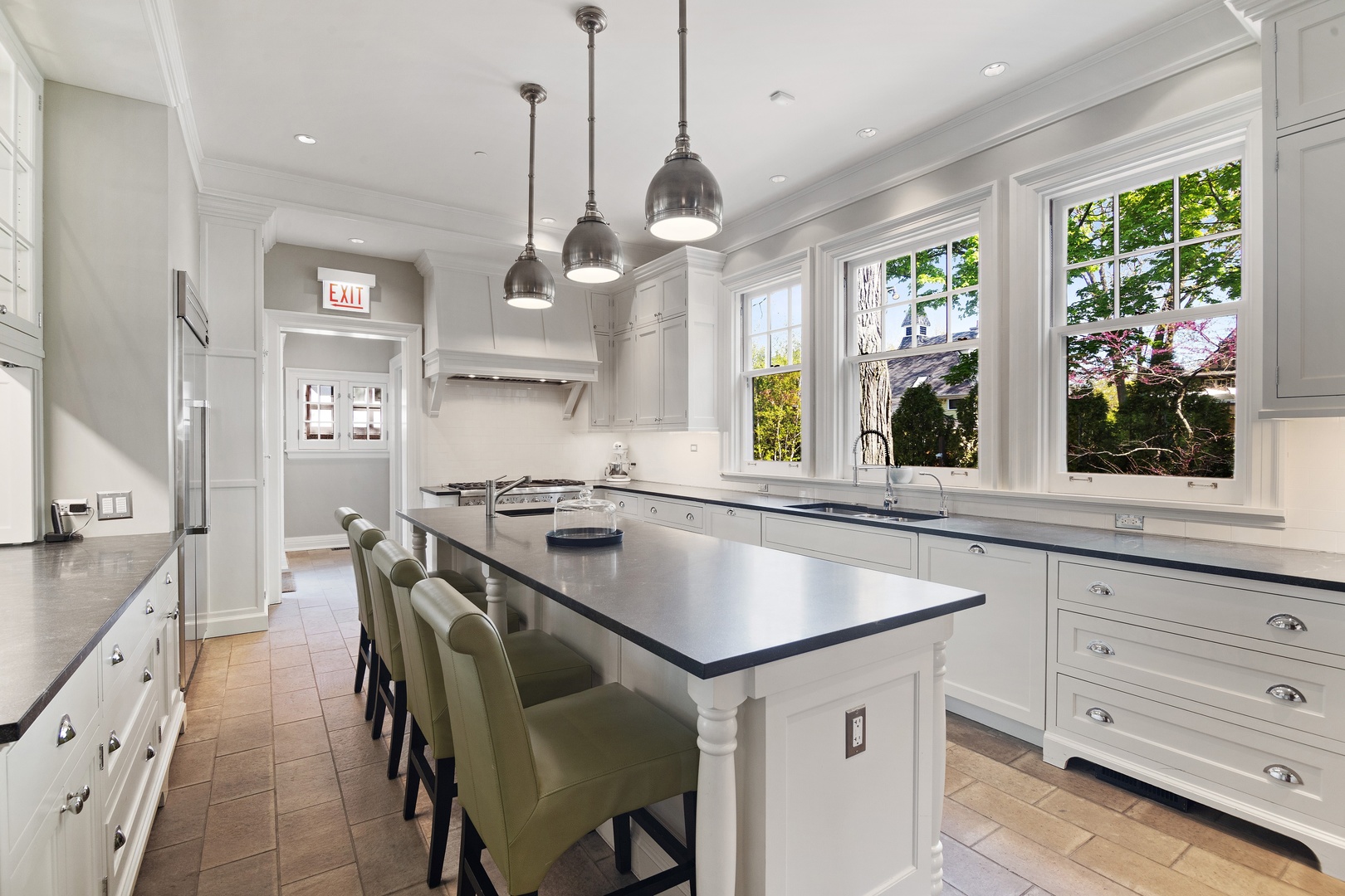 1622 Forest Place Evanston, IL 60201 - Photo 11 of 47 a kitchen with a table chairs and window