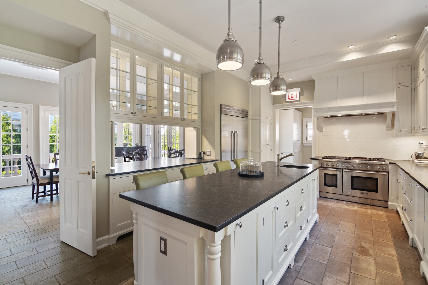 1622 Forest Place Evanston, IL 60201 - Photo 12 of 47 a kitchen with granite countertop a sink a counter top space appliances and cabinets
