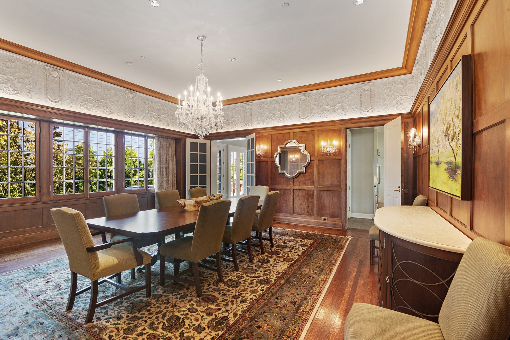 1622 Forest Place Evanston, IL 60201 - Photo 13 of 47 a view of a dining room with furniture wooden floor and chandelier