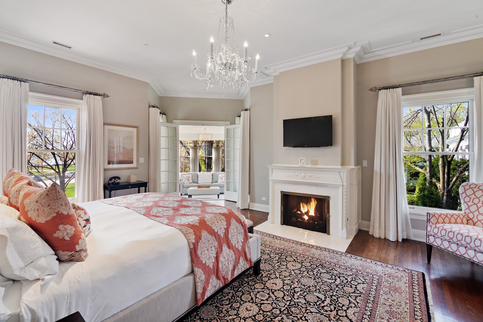 1622 Forest Place Evanston, IL 60201 - Photo 21 of 47 a bedroom with a large bed and a fireplace