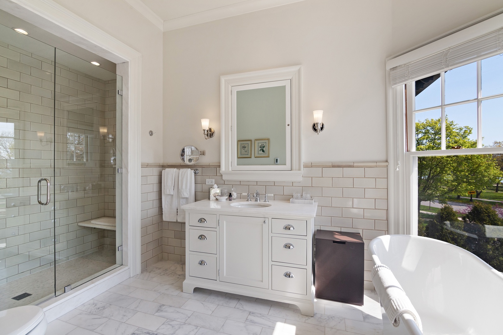 1622 Forest Place Evanston, IL 60201 - Photo 23 of 47 a bathroom with a tub sink toilet and shower