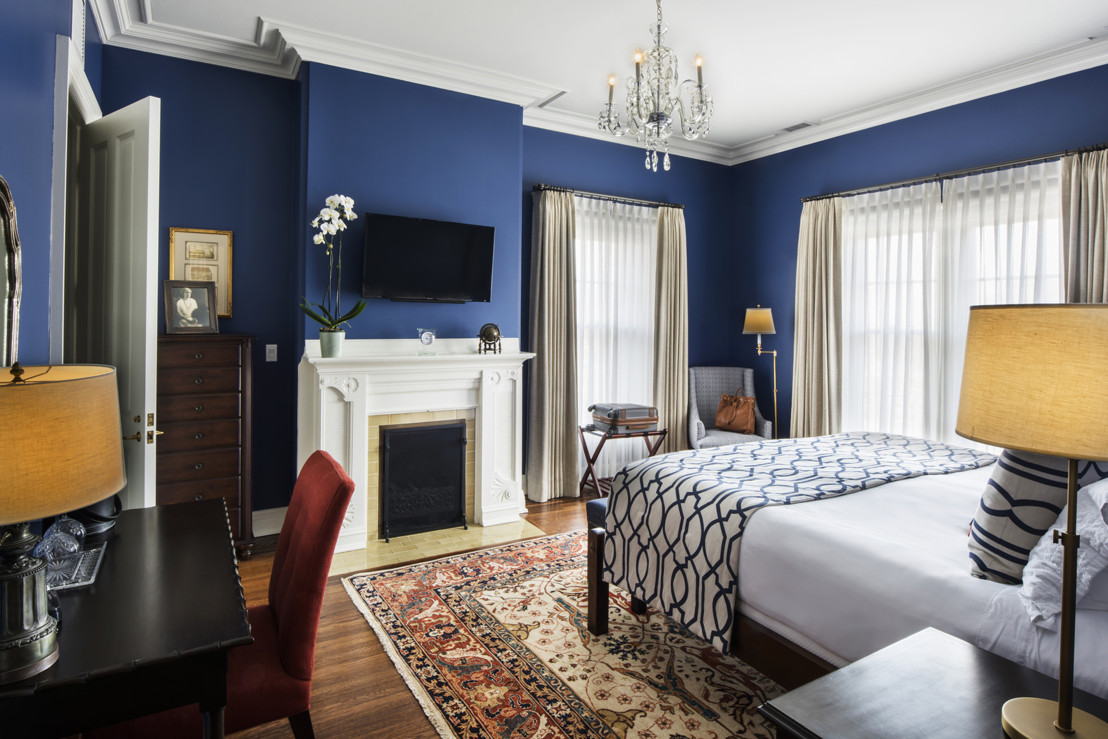 1622 Forest Place Evanston, IL 60201 - Photo 24 of 47 a bedroom with a bed and a fireplace