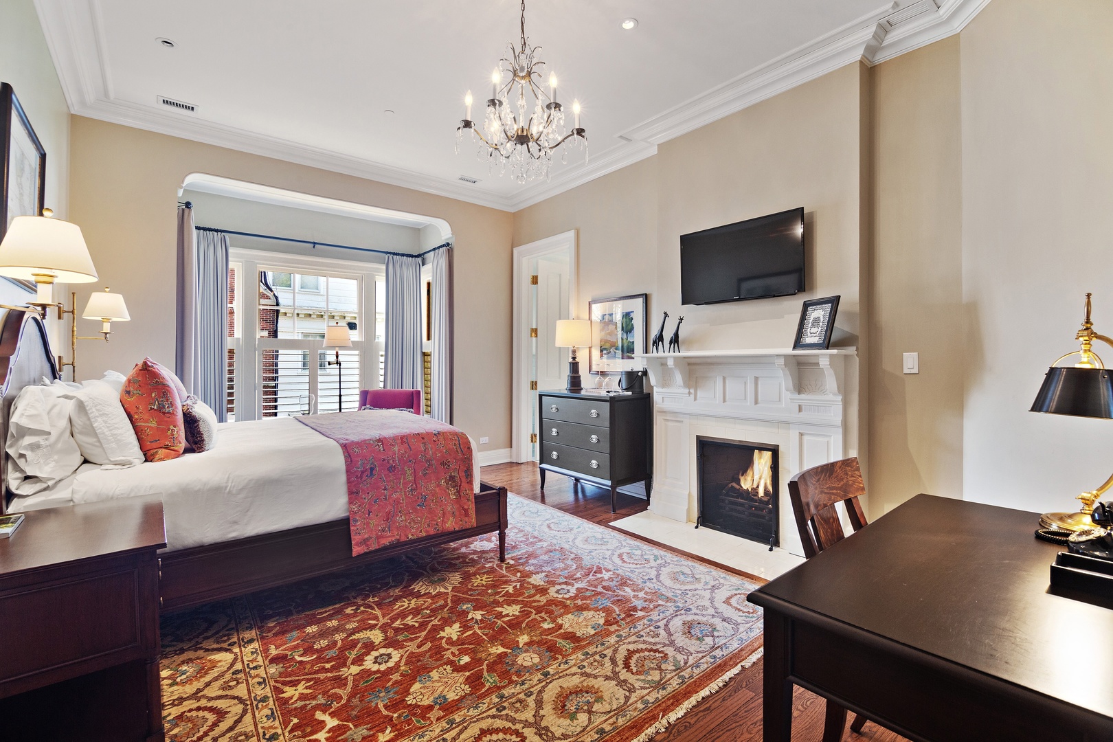 1622 Forest Place Evanston, IL 60201 - Photo 27 of 47 a bed room with a bed and a television