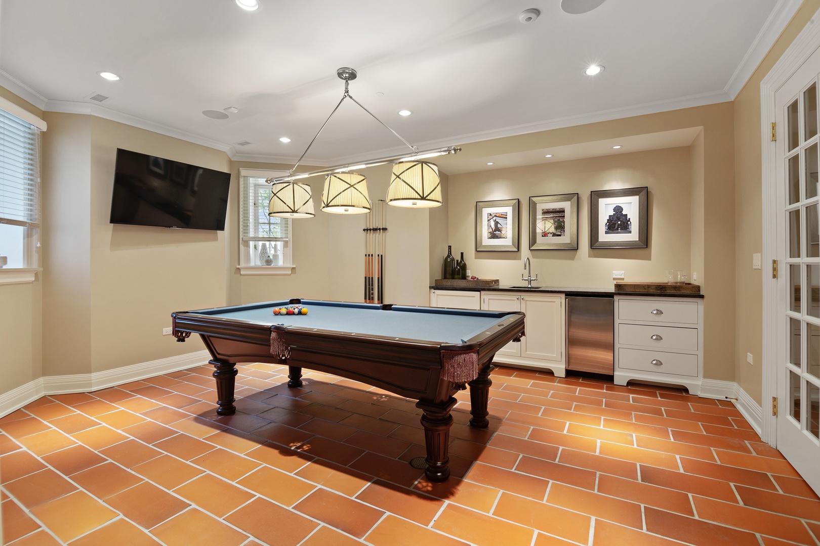 1622 Forest Place Evanston, IL 60201 - Photo 32 of 47 a room with pool table flat screen tv and windows