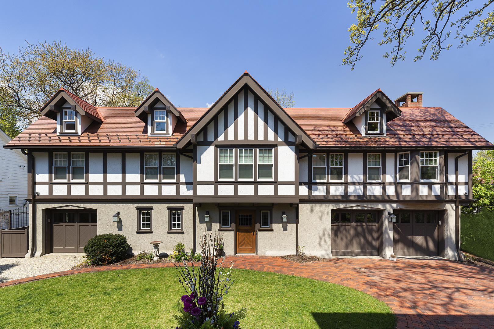 1622 Forest Place Evanston, IL 60201 - Photo 37 of 47 a front view of a house with a yard and potted plants
