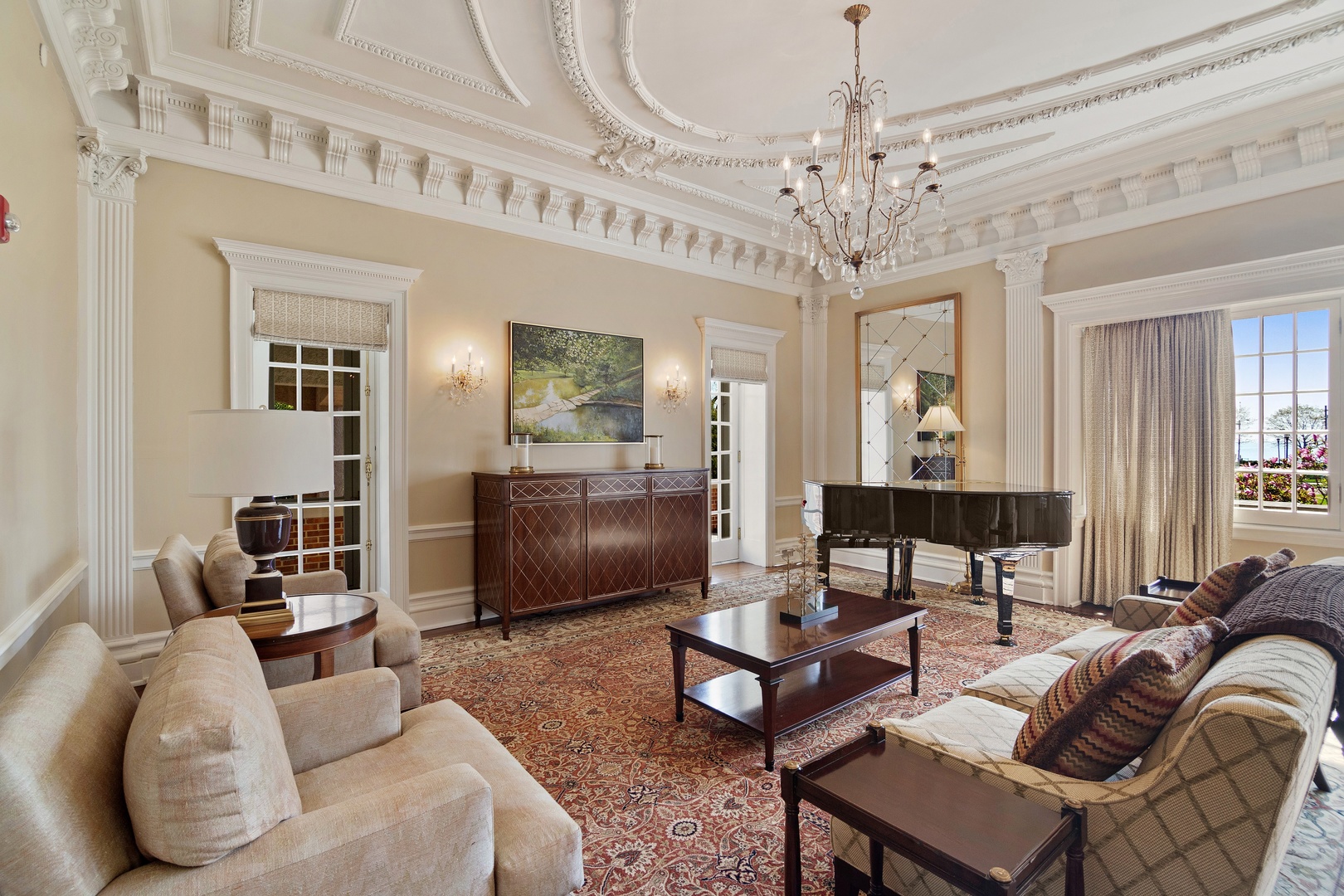 1622 Forest Place Evanston, IL 60201 - Photo 8 of 47 a living room with furniture a chandelier and a chandelier