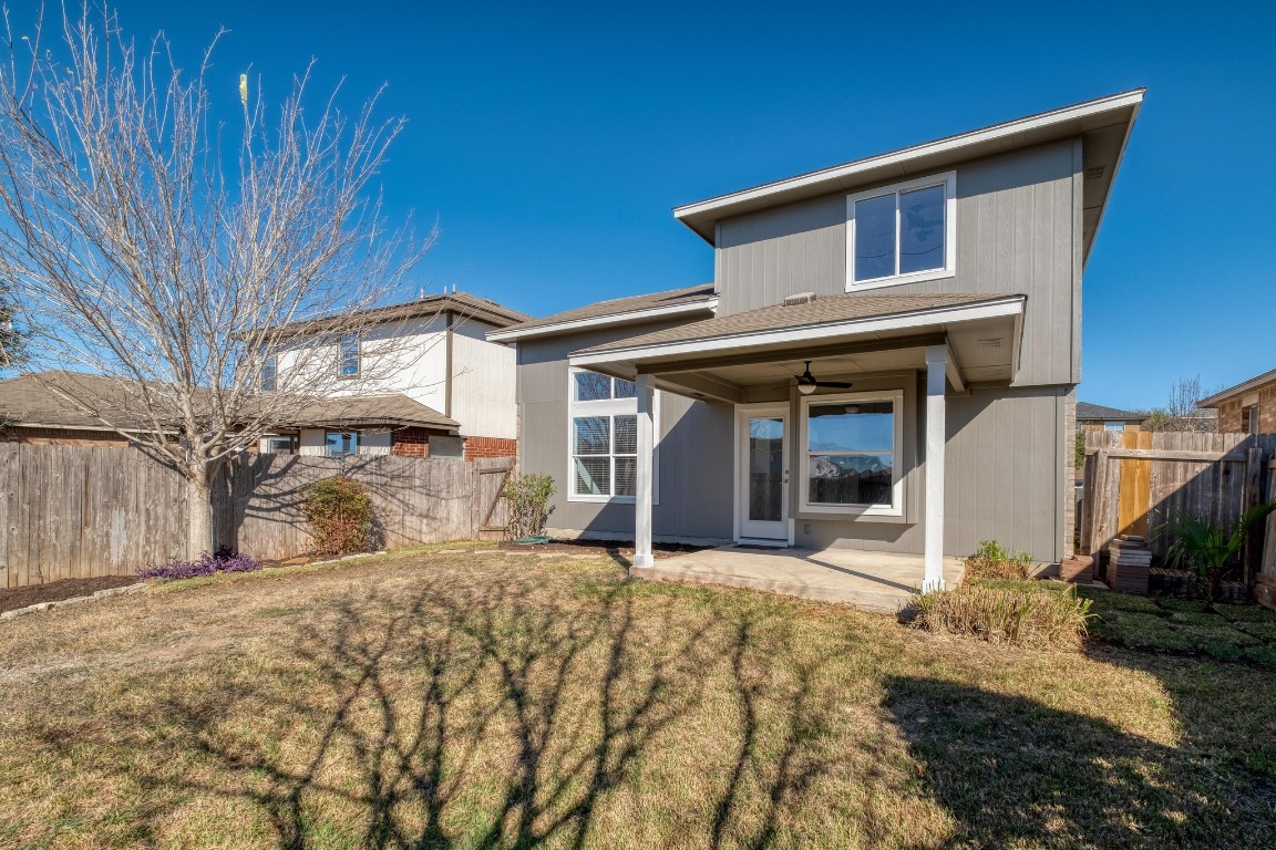 12825 James Madison Street Manor, TX 78653 - Photo 23 of 24 a view of a house with large windows