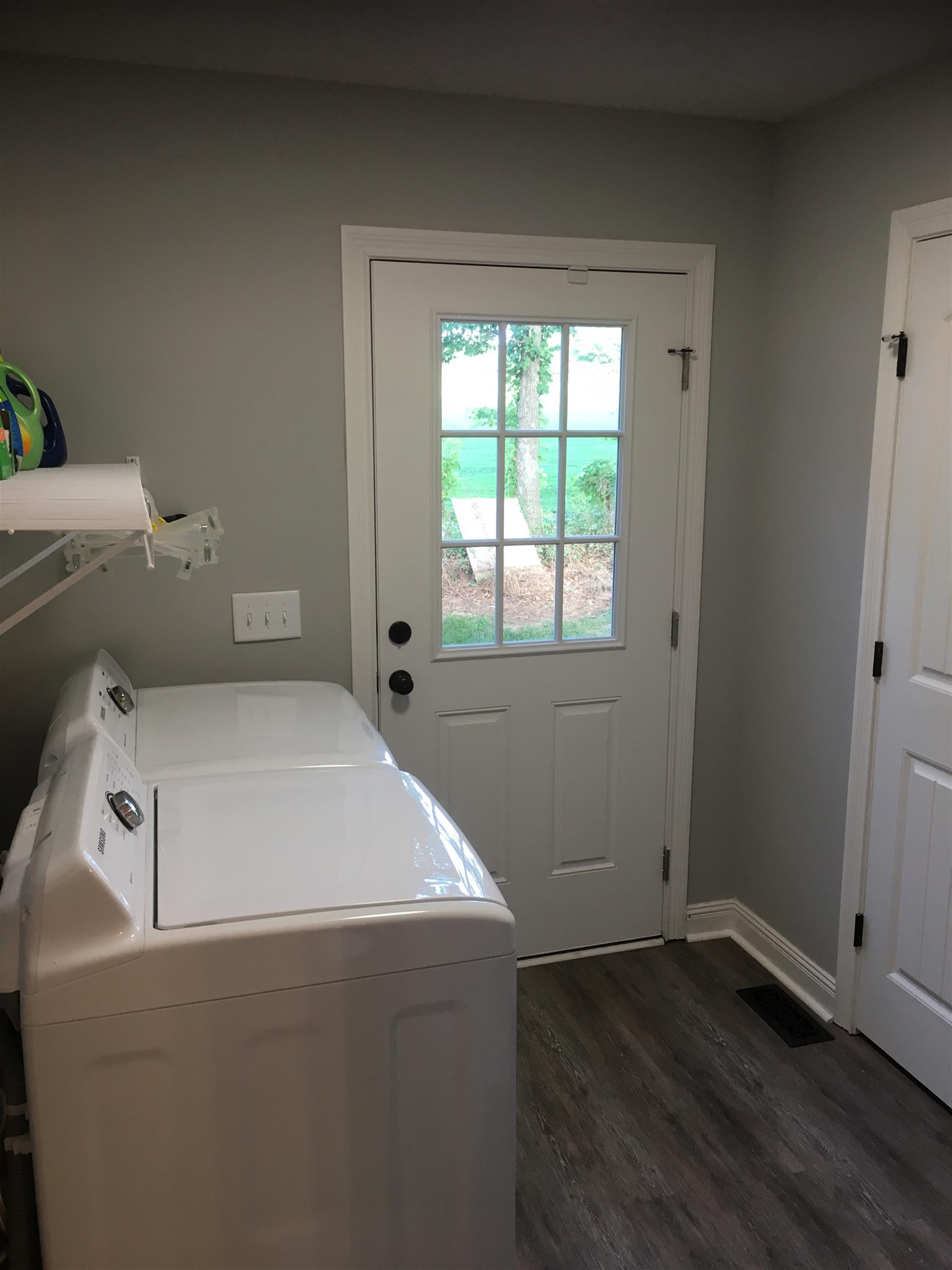 121 Point Road Portland, TN 37148 - Photo 12 of 23 a utility room with dryer and washer