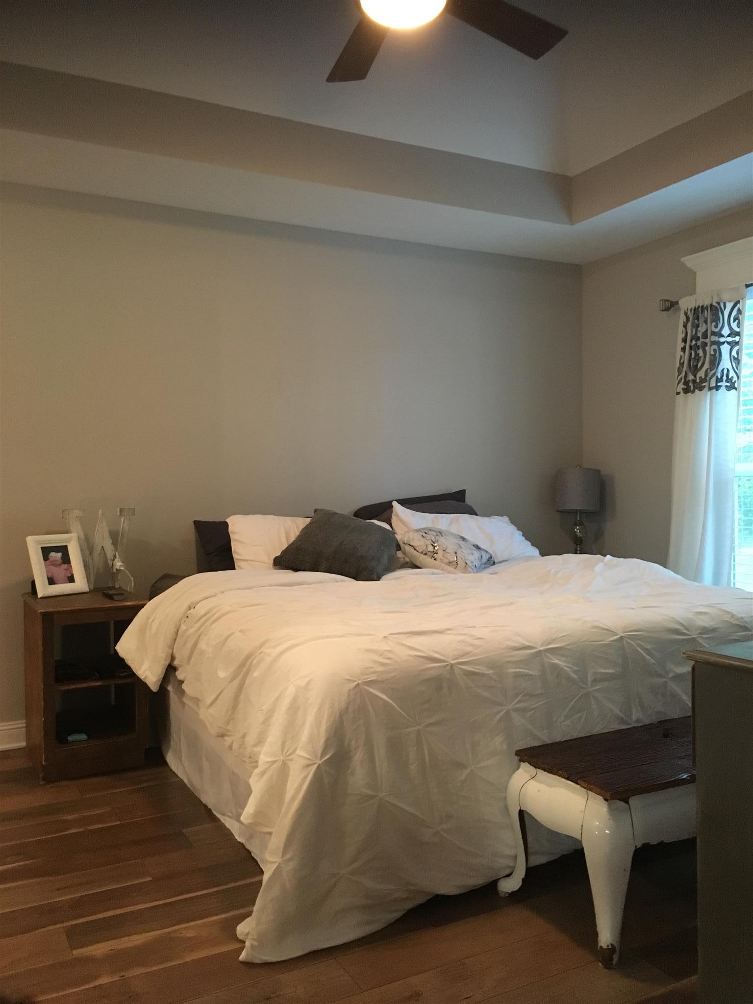 121 Point Road Portland, TN 37148 - Photo 13 of 23 a bedroom with a bed and wooden floor