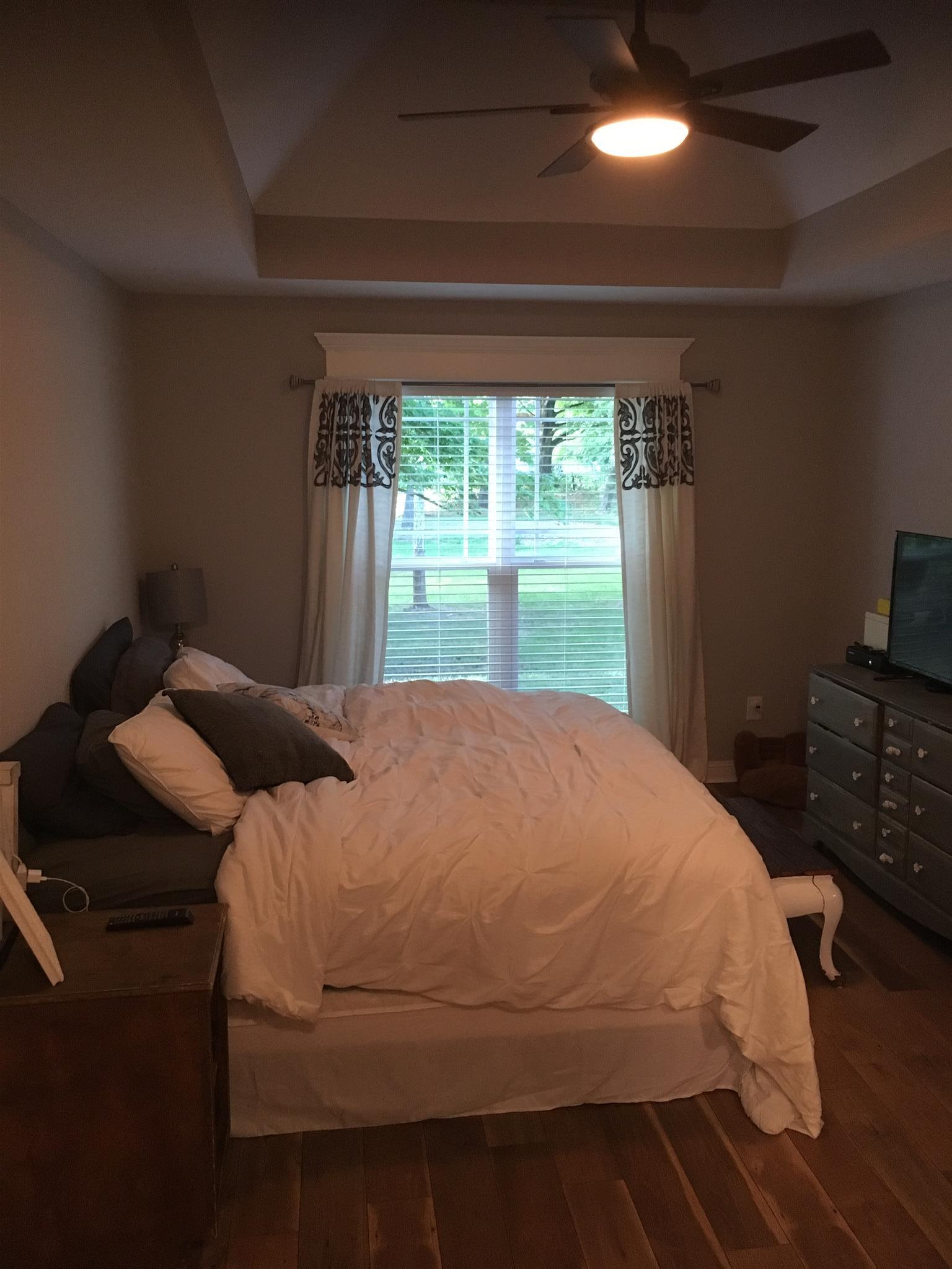 121 Point Road Portland, TN 37148 - Photo 14 of 23 a bedroom with a bed and a tv