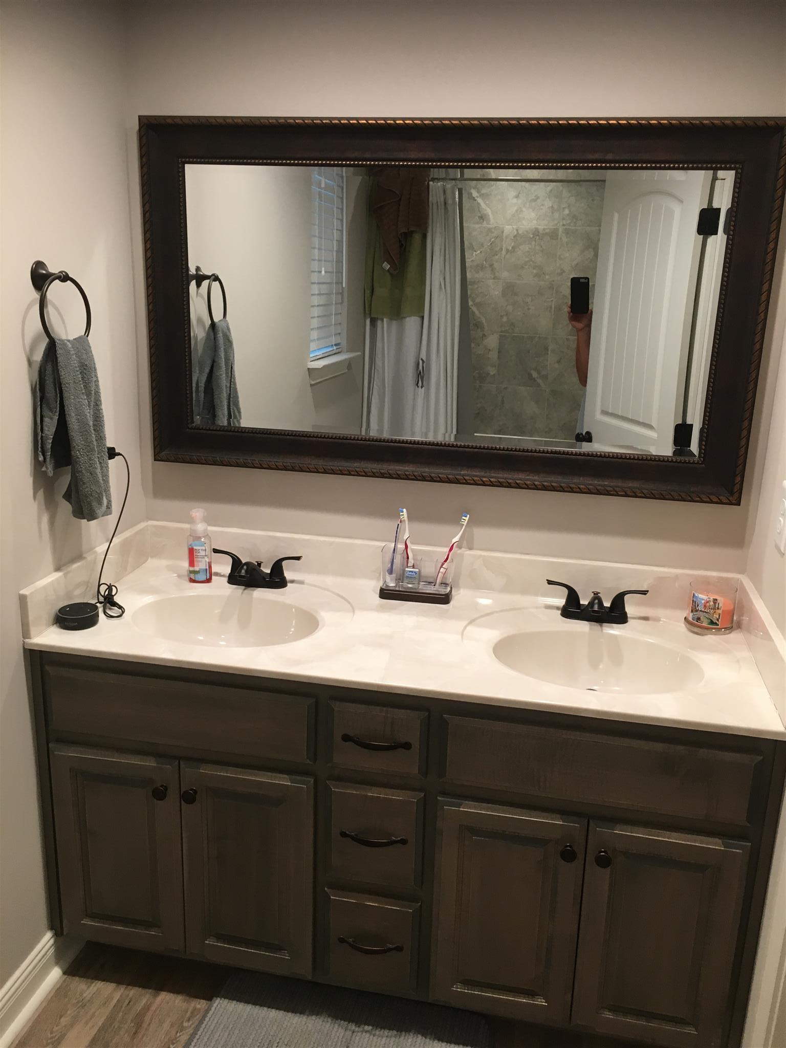 121 Point Road Portland, TN 37148 - Photo 17 of 23 a bathroom with a double vanity sink and a mirror