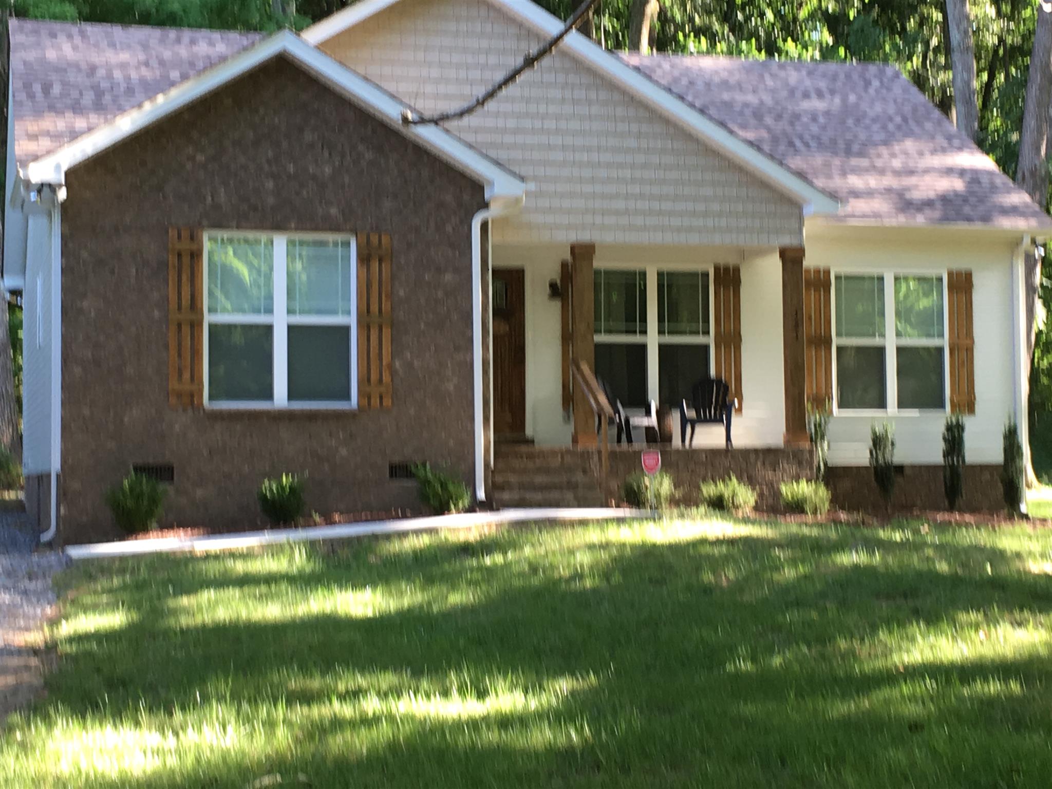121 Point Road Portland, TN 37148 - Photo 2 of 23 a view of house with backyard